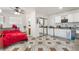 Multifunctional space with bedroom, kitchenette, and tiled flooring, offering versatile living arrangements at 4406 Parkchester Cir, Las Vegas, NV 89108