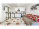 Cozy living space features a kitchenette, sofa, and patterned floors for a functional and stylish interior at 4406 Parkchester Cir, Las Vegas, NV 89108