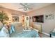 Coastal-themed bedroom with nautical decor and a large TV on the wall at 4419 Via Bianca Ave, Las Vegas, NV 89141