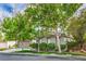 Charming single-story home exterior with mature trees and manicured landscaping at 4419 Via Bianca Ave, Las Vegas, NV 89141