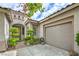 Inviting front exterior with a charming entrance and a well-maintained, attached one-car garage at 4419 Via Bianca Ave, Las Vegas, NV 89141