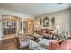 Spacious living room featuring hardwood floors and elegant furnishings at 4419 Via Bianca Ave, Las Vegas, NV 89141
