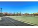 Well-maintained community tennis court surrounded by fencing at 4419 Via Bianca Ave, Las Vegas, NV 89141