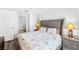 Bedroom with a large comfortable bed, neutral colors, and access to a bathroom at 4471 Dean Martin Dr # 1502, Las Vegas, NV 89103