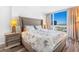 Bedroom with large windows offering a stunning city view at 4471 Dean Martin Dr # 1502, Las Vegas, NV 89103