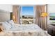Bright bedroom featuring floor to ceiling windows with a cityscape view at 4471 Dean Martin Dr # 1502, Las Vegas, NV 89103