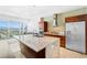 Modern kitchen features stainless steel appliances, granite countertops, and a breakfast bar at 4471 Dean Martin Dr # 1502, Las Vegas, NV 89103