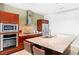 Modern kitchen features stainless steel appliances, granite countertops, and a breakfast bar at 4471 Dean Martin Dr # 1502, Las Vegas, NV 89103