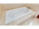 Luxurious bathtub with stone surround for a relaxing spa experience at 4575 Dean Martin Dr # 2701, Las Vegas, NV 89103