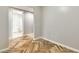 Hallway featuring wood-patterned floors and access to a bathroom with a view at 4575 Dean Martin Dr # 2701, Las Vegas, NV 89103