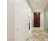 Hallway featuring wood-patterned floors and access to other rooms in the home at 4575 Dean Martin Dr # 2701, Las Vegas, NV 89103