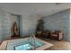 Indoor hot tub featuring a bronze statue and blue mosaic tiles at 4575 Dean Martin Dr # 2701, Las Vegas, NV 89103