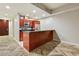 Kitchen featuring a bar counter area and views of the hallway in the home at 4575 Dean Martin Dr # 2701, Las Vegas, NV 89103