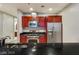 Stylish kitchen with stainless steel appliances and dark countertops adding modern contrast at 4575 Dean Martin Dr # 2701, Las Vegas, NV 89103