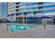Exterior pool featuring lounge chairs and a skyscraper in the background at 4575 Dean Martin Dr # 2701, Las Vegas, NV 89103
