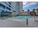 Exterior pool featuring lounge chairs and a skyscraper in the background at 4575 Dean Martin Dr # 2701, Las Vegas, NV 89103