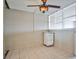 A bedroom featuring tiled floors and a white cabinet at 4600 University Center Dr # 175, Las Vegas, NV 89119