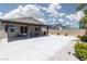 Backyard patio with a desert landscaping and a privacy wall at 5136 Stonecrop St, North Las Vegas, NV 89031