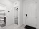 A view of the entryway that shows the bathroom and bedroom at 5136 Stonecrop St, North Las Vegas, NV 89031
