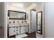 Bathroom featuring a double vanity, sliding barn doors, and modern fixtures at 517 Scenic Terra Dr, Henderson, NV 89015