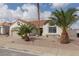 Street view of single-story home with desert landscaping and a classic terra cotta roof at 517 Scenic Terra Dr, Henderson, NV 89015