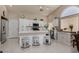 Bright kitchen with white cabinets, modern appliances, and a large island, perfect for entertaining at 517 Scenic Terra Dr, Henderson, NV 89015