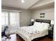 Bedroom with a large bed, sliding glass doors, and neutral paint at 5201 S Torrey Pines Dr # 1253, Las Vegas, NV 89118