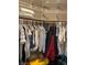 Organized walk-in closet with shelves, hanging rods, and ample storage space for clothes and personal belongings at 5201 S Torrey Pines Dr # 1253, Las Vegas, NV 89118