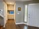 Open foyer featuring wood floors, natural light, and easy access to the home's amenities at 5201 S Torrey Pines Dr # 1253, Las Vegas, NV 89118