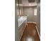 Hallway with cabinetry and laminate flooring at 5201 S Torrey Pines Dr # 1253, Las Vegas, NV 89118