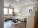 Bright living room with a ceiling fan and wood floors at 5201 S Torrey Pines Dr # 1253, Las Vegas, NV 89118