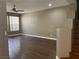 Spacious living room features wood laminate flooring and plenty of natural light at 5201 S Torrey Pines Dr # 1253, Las Vegas, NV 89118