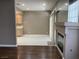 Inviting living space boasts fireplace, patio door, and view of adjacent kitchen at 5201 S Torrey Pines Dr # 1253, Las Vegas, NV 89118