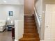 Wooden staircase providing access to the upper level of the home at 5201 S Torrey Pines Dr # 1253, Las Vegas, NV 89118