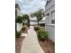 Paved walkway with mature landscaping, trees, and shrubbery at 5201 S Torrey Pines Dr # 1253, Las Vegas, NV 89118