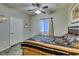 Bedroom with a ceiling fan, window, and door to a large closet at 5250 S Rainbow Blvd # 1084, Las Vegas, NV 89118