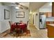 Dining area adjacent to the kitchen with hardwood floors and plenty of sunlight at 5250 S Rainbow Blvd # 1084, Las Vegas, NV 89118