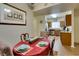 Dining area that is open to the kitchen, with views of stainless steel appliances at 5250 S Rainbow Blvd # 1084, Las Vegas, NV 89118