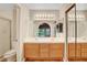 Main bathroom features a dual sink vanity with ample counter space at 5373 Painted Mirage Rd, Las Vegas, NV 89149