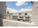 View from the balcony overlooking the garages and surrounding buildings at 5516 Orchard Ln # 0, Las Vegas, NV 89110