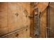 Close-up of the updated shower system with modern fixtures and tile work at 5516 Orchard Ln # 0, Las Vegas, NV 89110