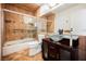 Bathroom with a glass bowl sink, tiled walls, and a shower/tub combo at 5516 Orchard Ln # 0, Las Vegas, NV 89110