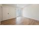 The bedroom features an ensuite bathroom and sliding glass door to private balcony at 5516 Orchard Ln # 0, Las Vegas, NV 89110
