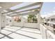 A second-story patio with white facade and nice view at 5516 Orchard Ln # 0, Las Vegas, NV 89110
