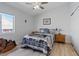 Bedroom featuring hardwood floors, a ceiling fan, and a toy at 5812 Spinnaker Reach Ave, Las Vegas, NV 89130