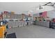 Well-organized garage with custom cabinets and epoxy flooring at 5812 Spinnaker Reach Ave, Las Vegas, NV 89130