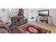 Relaxing living room with ample seating and access to other areas of the house at 5812 Spinnaker Reach Ave, Las Vegas, NV 89130