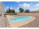 Backyard pool provides a private oasis for relaxation and recreation with desert landscaping at 5812 Spinnaker Reach Ave, Las Vegas, NV 89130