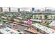 Aerial view showing apartments with covered parking and a Las Vegas skyline at 595 S Royal Crest Cir # 24, Las Vegas, NV 89169