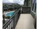 Balcony view overlooking the community pool providing a relaxing outdoor space at 6450 Spring Jog St, Las Vegas, NV 89166